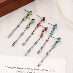 Three pairs of long tassel earrings in emerald green, ruby red, and ocean blue finish