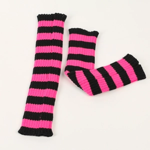 Detail of pink and black striped knit leg warmers with high elastic ribbed texture