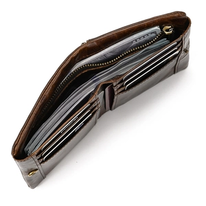 Detail view of leather wallet interior with card slots and a secure zipper pocket