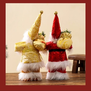 Detail view of standing Santa Claus dolls showing red and gold fabric and bell ornaments