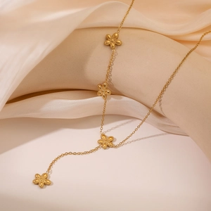Elegant gold-plated stainless steel four-leaf clover pendant necklace for women on silk