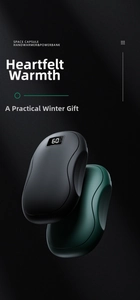 Detail of space capsule hand warmer with LED digital display showing battery and temperature