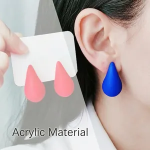 Chunky teardrop acrylic earrings in vibrant royal blue and coral red fashion style