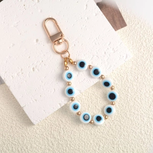Vintage Turkish evil eye beaded keychain with blue resin beads and golden hardware accents