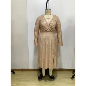 Detail of rose gold plus size sequin dress featuring wrap V-neck and vertical shimmering texture