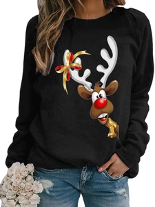 Detailed close-up of Christmas reindeer print on a black crewneck long sleeve t-shirt
