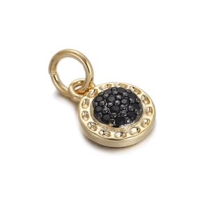 Detailed view of a gold-plated round pendant with micro-pave black gemstones for jewelry DIY