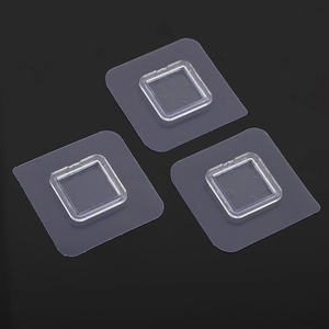 Three transparent adhesive hooks for wall shelves featuring strong claw buckle attachment