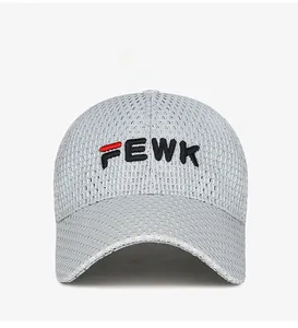 Close-up of FEWK letter embroidery on breathable grey mesh baseball cap for outdoor sun protection