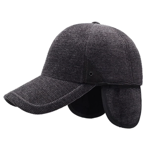 Deep grey winter baseball cap with ear flaps and warm thick ribbed texture fabric
