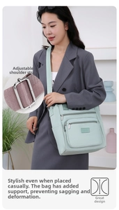 Detail of adjustable purple woven strap on a mint green nylon crossbody shoulder bag