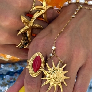 Gold starfish ring and red agate stone band set with vintage sun charm jewelry