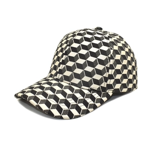 Baseball cap with 3D black and white geometric cube pattern and curved brim