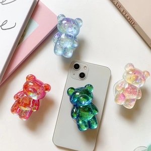 Macro shot of 3D bear phone sockets with iridescent laser finish and pop-up grips
