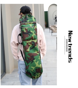 Camo skateboard bag with drawstring closure and functional zipper side pockets