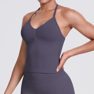 Macro view of seamless knitted sports top featuring chest pleats and fine ribbed texture