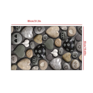 Absorbent 80x50cm bathroom mat with 3D pebble heart pattern and non-slip surface