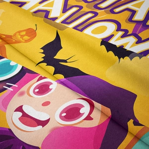 Detail shot of soft flannel Halloween tapestry showing vibrant prints and fuzzy texture