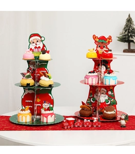 Three-tier Christmas paper cupcake stands with Santa and reindeer designs for parties