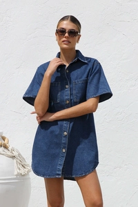 Close-up of a dark blue denim short-sleeved dress with front buttons and lapel collar