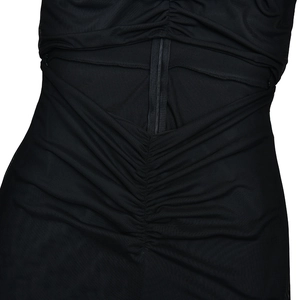 Detailed back view showing the invisible zipper and ruched texture of the black dress