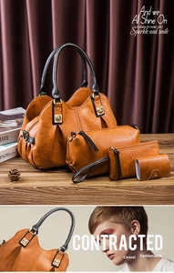 Detail of 4-in-1 brown litchi pattern bag set featuring tote, clutch and metal hardware