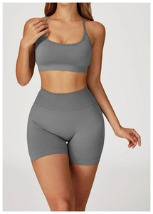Detailed texture of seamless gray yoga bra and high waist shorts with ribbed waistband