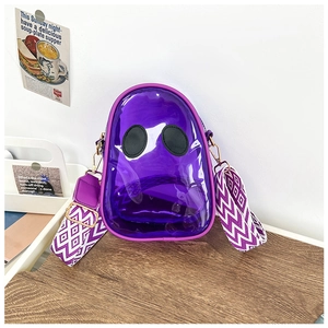 Detail of purple transparent alien PVC bag with a patterned geometric wide shoulder strap
