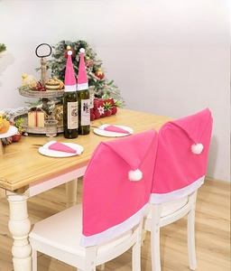 Rosa Weihnachts-Set mit Stuhlhussen, Weinflaschenhüllen und Besteckhaltern für den Esstisch