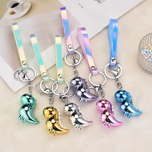 Colorful metallic dinosaur keychains with laser PVC straps in six assorted vibrant colors
