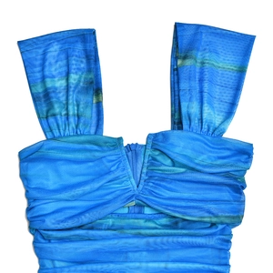 Detail of blue mesh fabric with ruching texture and deep V-neckline on a floral dress