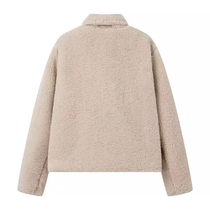 Back view of a beige faux lamb wool jacket featuring a stylish lapel and soft plush texture