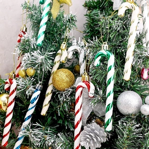 Christmas tree decoration set with colorful candy canes and glitter balls for festive home decor