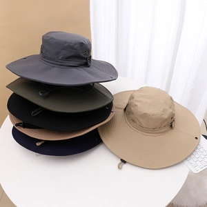 Stack of wide brim sun hats in various colors with adjustable windproof neck straps