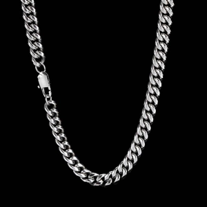 Close-up of classic silver Cuban link chain necklace with polished metallic finish