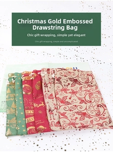 Detailed view of burlap Christmas drawstring bags with gold foil reindeer and snowflake patterns