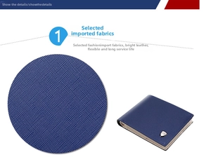 Detailed close-up of blue cross-grain leather wallet texture with small metal shield logo