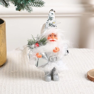 Standing silver Santa Claus figurine with sequin hat and glitter boots for Christmas decor