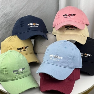 Distressed cotton baseball caps with Malinsky embroidery in various colors stack