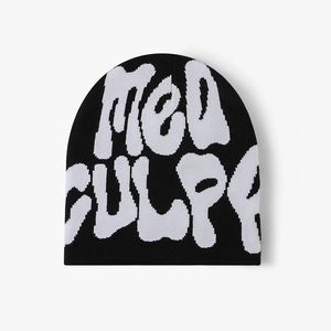 Detailed knit texture of the black Y2K beanie featuring white MEA CULPA jacquard pattern