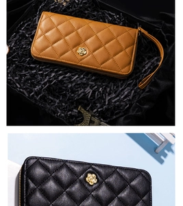 Detailed close-up of quilted long wallets with camellia flower hardware and wrist strap