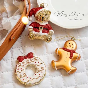 Three-piece sparkling Christmas tree ornaments set including bear, gingerbread man and wreath