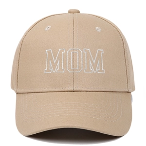 Close-up of white MOM embroidery on khaki cotton twill baseball cap with curved brim