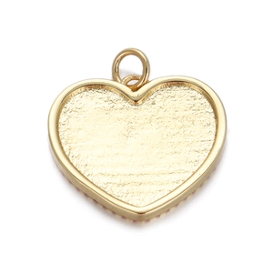 Macro shot of 14K gold-plated heart pendant back with textured finish and bail