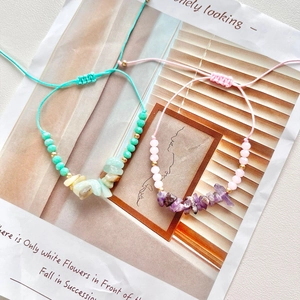 Handmade colorful crystal bead friendship bracelets set with turquoise and pink woven ropes
