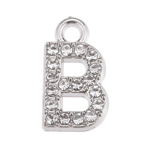 Macro shot of silver letter B charm pendant featuring detailed sparkling white rhinestones