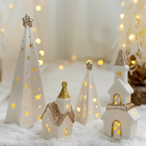 Illuminated white ceramic Christmas tree and house set with gold glitter accents