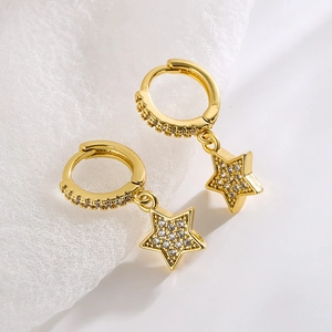 Minimalist 18K gold plated hoop earrings with zircon star charms on white fabric