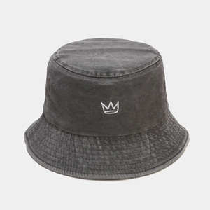 Washed black vintage cotton bucket hat featuring a white crown embroidery detail