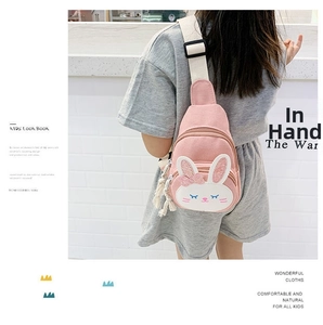 Pink canvas kid chest bag with cute cartoon bunny and adjustable strap shown on model
